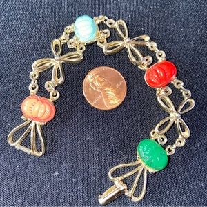 Scarab beads bracelet links gold tone Measures 7”1/4 long x 5/8” deep